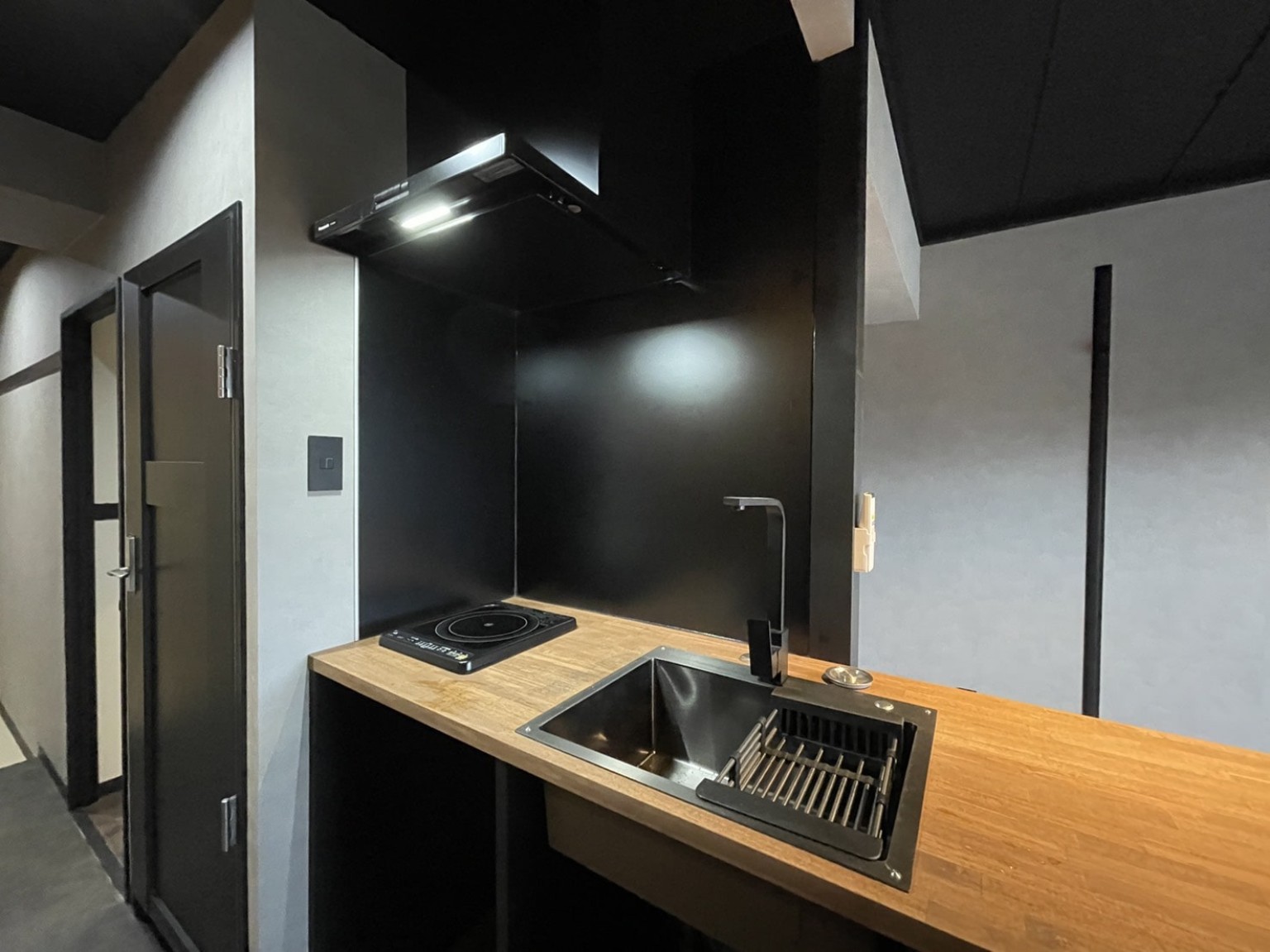 Black and timber kitchenette