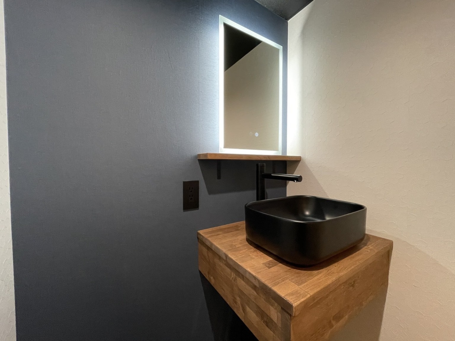 Timber vanity with illuminated mirror