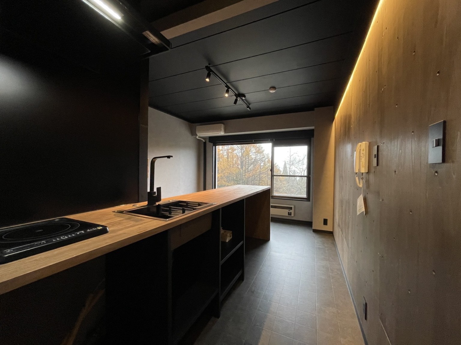 Room 306 charcoal and timber interior